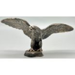 A vintage nicely sculpted bronze Eagle. His Wingspan is 14.5cm and he stands 7cm tall.