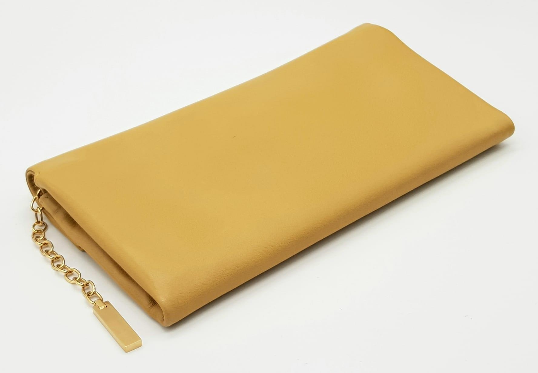 A Prada Brown Leather Clutch Bag in Box. Soft brown leather with gilded hardware. 20cm width by 11cm - Image 5 of 9