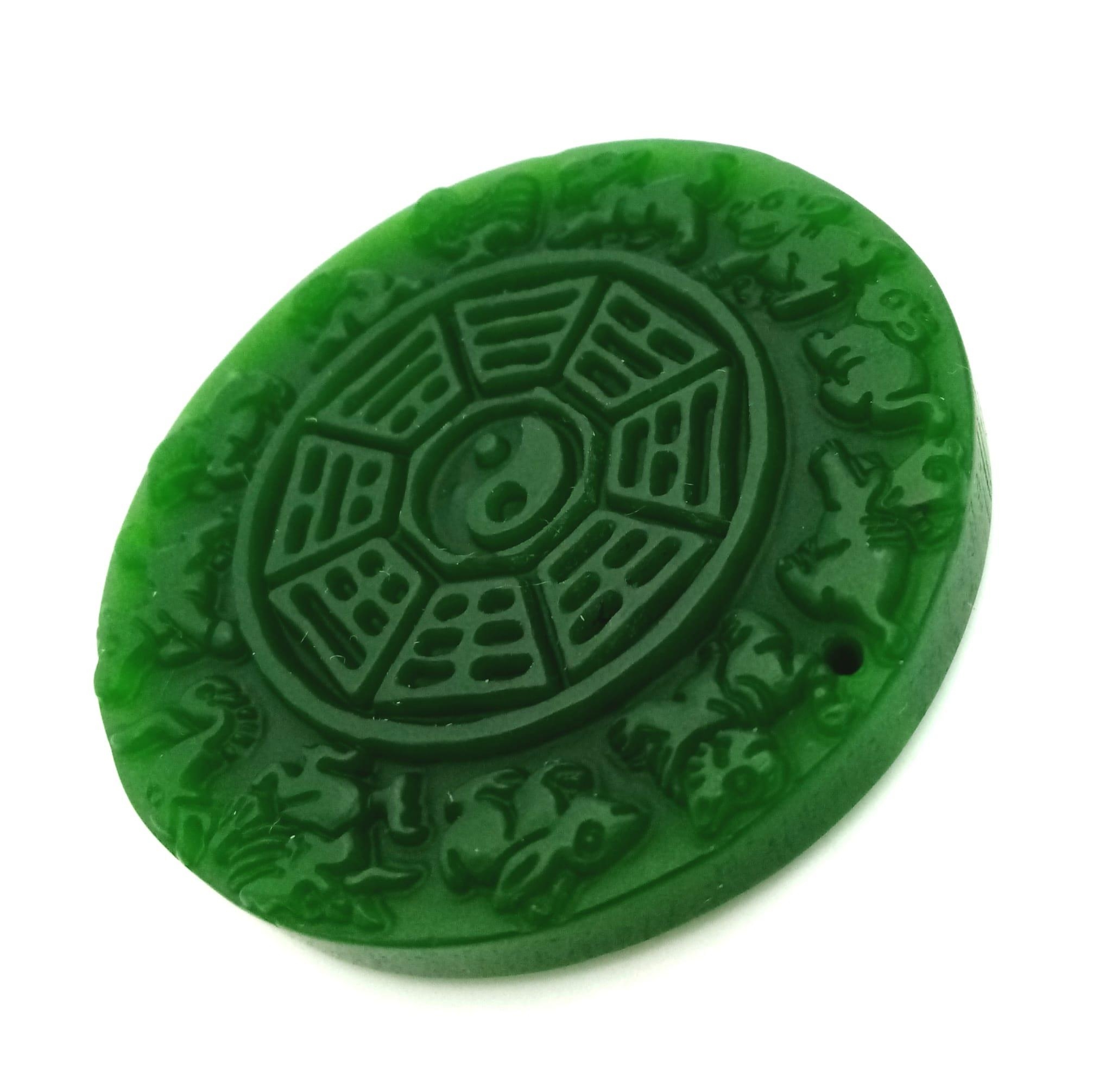 A Chinese Green Jade Astrology Pendant. 5cm diameter. - Image 2 of 3