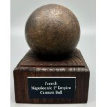 French Napoleonic 1st Empire Iron Cannon Ball on wooden plinth.