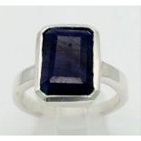 925 Silver Ring. Faceted Blue Sapphire. Size T. Blue Sapphire - 10.37 Ct.