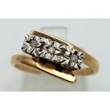 A mid century star set diamond ring set in 9k yellow gold, Ring Size N, Total Weight 2.8 grams.