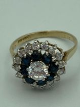 9 carat GOLD,SAPPHIRE and Zirconia HALO RING, stunning statement piece of jewellery.3.1 grams Size