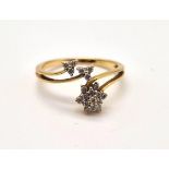 A fancy, 18 K yellow gold diamond (0.18 carats) flower ring. Size: L, weight: 2.2 g.