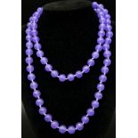 An Opera Length (84cm) Lavender Jade Bead Necklace. 8mm beads.