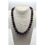 A Deep Shades of Purple Amethyst Graduated Bead Necklace. 10-15mm.