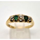 A vintage 18 K yellow gold ring with diamond and emeralds (0.40 carats) Ring size: P, weight: 3.4 g.