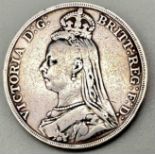 An 1888 Queen Victoria Silver Crown Coin. Good definition but please see photos.