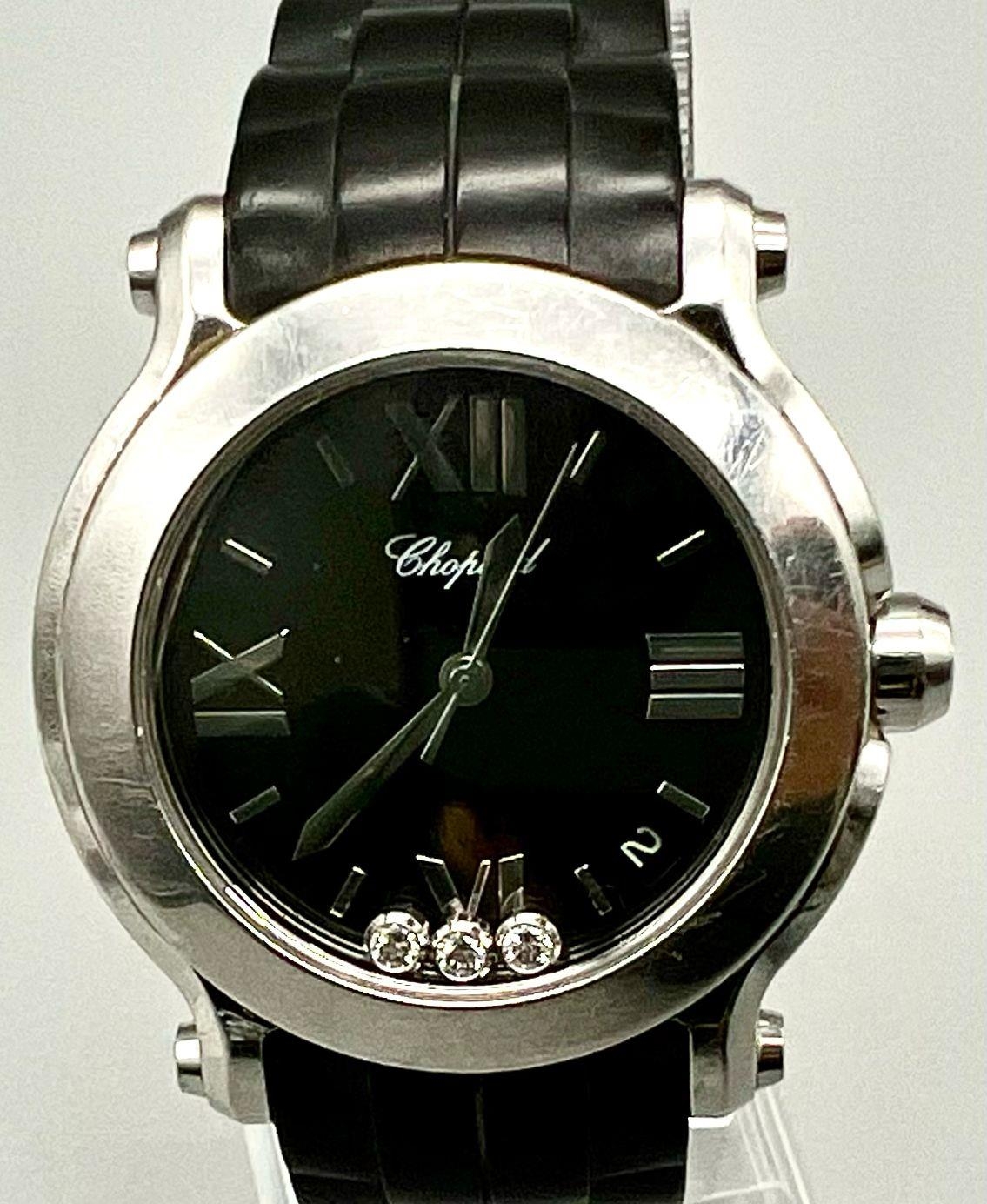 A Chopard Happy Sport Ladies Watch. Chopard black rubber strap. Stainless steel case - 36mm. Black