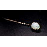 A Victorian High Karat Opal Stick Pin. 6cm. 1.22g total weight.