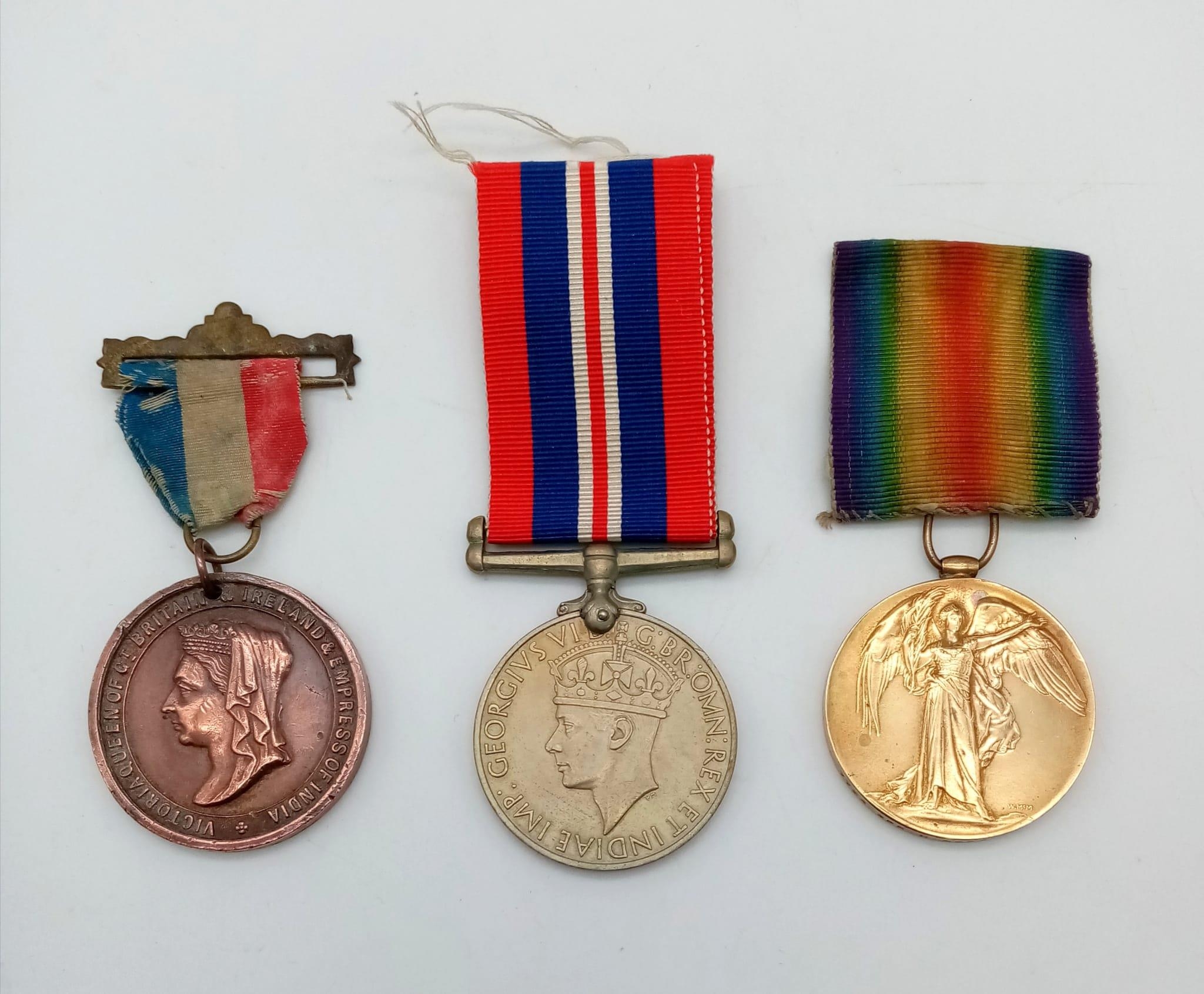 A Selection of 3 Medals with Ribbons. Queen Victoria 1897 Jubilee Bronze Medal. British Empire WW1