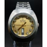 A Vintage Omax 17 Jewel Automatic Gents Watch. 17 jewel with crystal stone decoration on golden