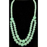 An Unusual Shape Light Green Chinese Jade Double Row Bead Necklace. 44-46cm necklace length. Beads