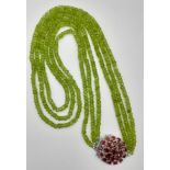 3 Row Peridot Gemstone Necklace with Garnet Clasp in 925 Silver, 440cts in total , Comes on side