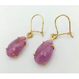 A Pair of 9K Yellow Gold and Ruby Teardrop Earrings. 2g total weight.
