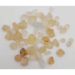 A 374.25 Ct Rough Yellow Sapphire Lot.