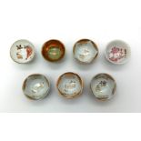 An Assortment of 7 Antique Japanese Bone China Saki cups. good condition for age, some nicely