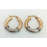 9k 2 colour hoop earrings. Weighs 3.7g. 2.2cm diameter