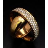 18k Gold Diamond Revolving Ring that can also be used as a Pendant. Total Weight 29.61grams. Size T.