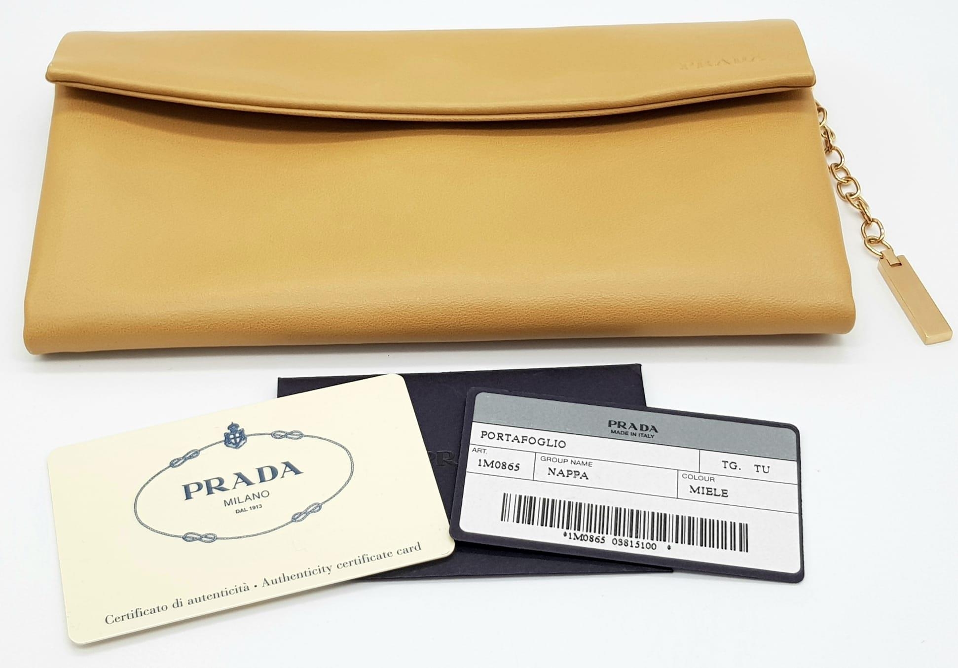 A Prada Brown Leather Clutch Bag in Box. Soft brown leather with gilded hardware. 20cm width by 11cm - Image 8 of 9