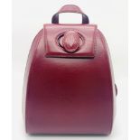 A Lovely Must de Cartier Small Backpack. Burgundy leather with embossed logo to the front. Single