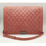 A Chanel Maxi Boy Shoulder Bag. Pink quilted suede flap on leather. Heavy brushed steel finish on