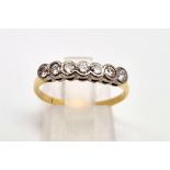 An 18 K yellow gold ring with seven diamonds ( 0.50 carats). Ring size: R, weight: 2.3 g.