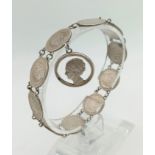 A Vintage Silver Bracelet Linked with 10 x 10 Cent Silver Dutch Coins. 20cm. 18g