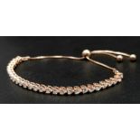 A Sterling Silver Rose Gold Plated Bracelet with White Stone Decoration. 18cm. Comes with a
