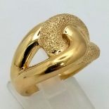 A 925 Silver Gold Plated Dress Ring. Interlock design with bark-effect decoration. Size R. 8.6g