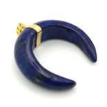 A Lapis Lazuli Crescent Pendant. Gilded attachment. 3 x 3.5cm.