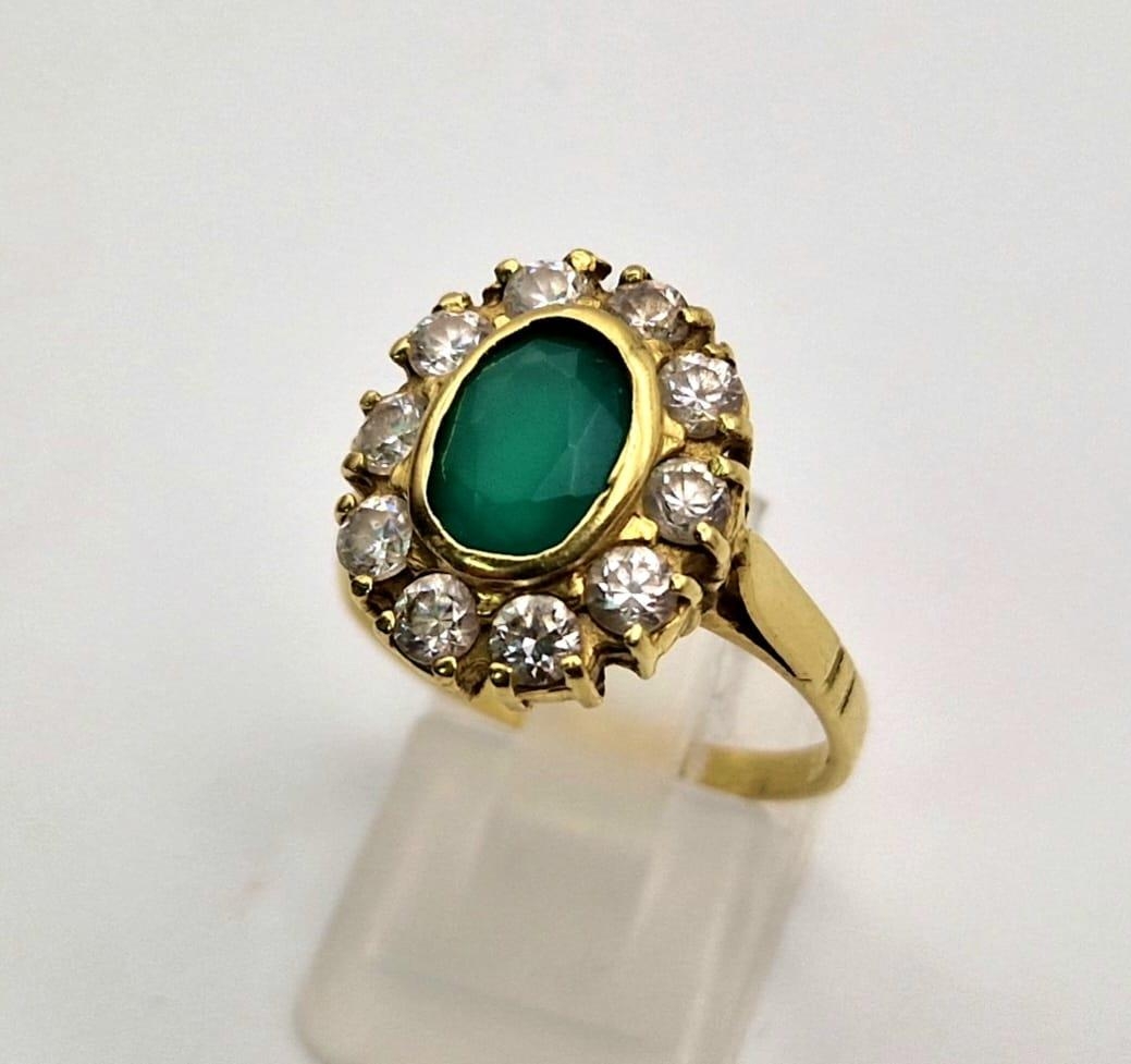 An 18 K yellow gold, stone set cluster ring. Size: Q, weight: 5.6 g. - Image 3 of 7