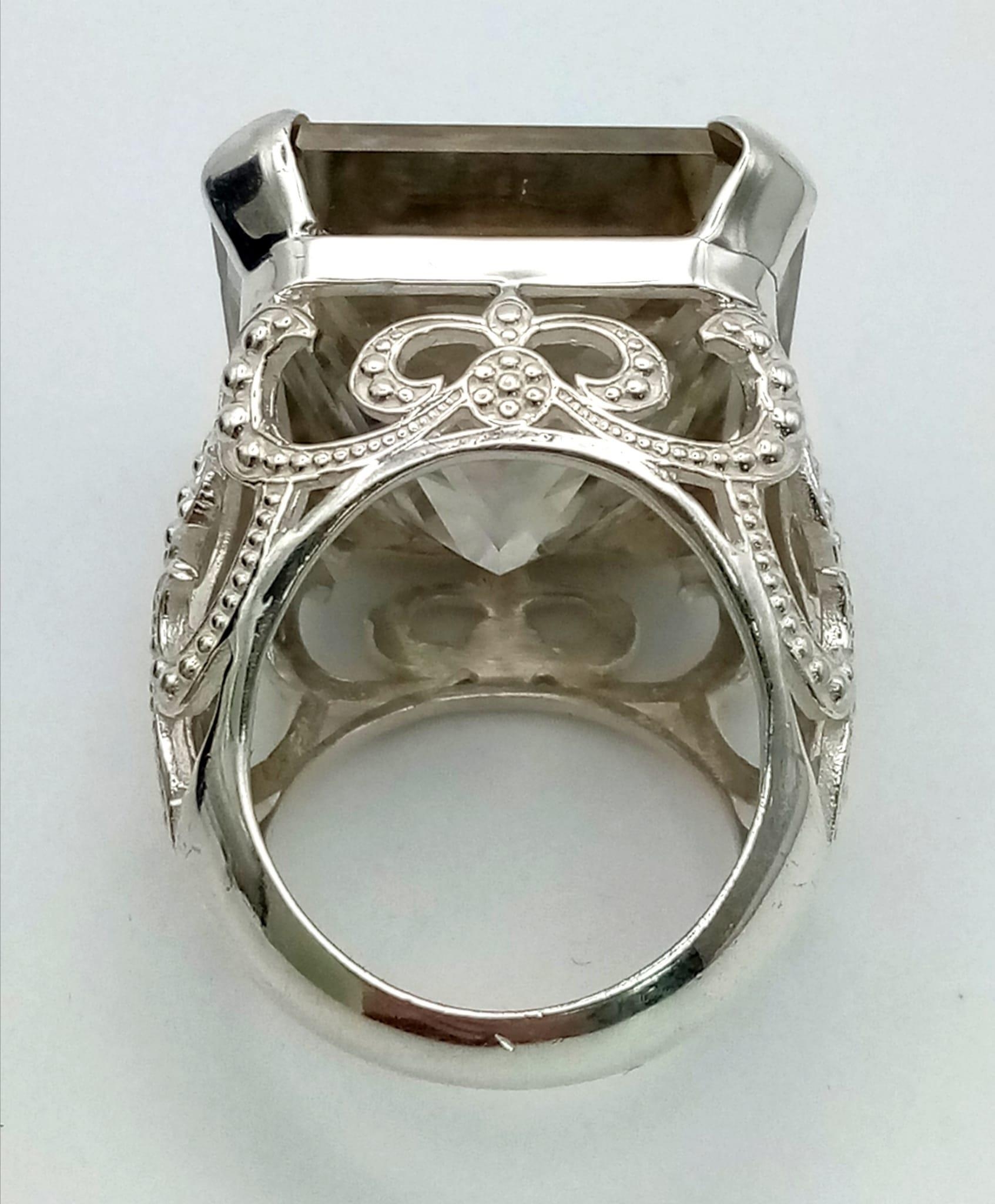 A Rare 79.4ct Brandy Shade Moissanite Ring set in 925 Silver. Size S. 31g total weight. - Image 4 of 6