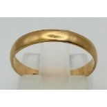 An 18k Yellow Gold Small Band Ring. Size L. 1.31g.