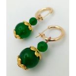A Pair of Green Jade Graduated Ball Earrings. Gilded spacers and ear hooks. Largest ball - 12mm.