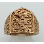 9k yellow gold 3 lions signet ring. Total Weight 5.8g, size V