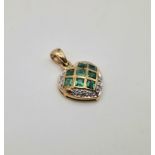 9k yellow gold diamond and emerald pendant. Total Weight 1g (dia:0.08ct/emerald:0.55ct)