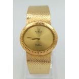 A Vintage 18K Gold Rolex Cellini Ladies Watch. 18K gold bracelet and case - 25mm. Gold tone dial.