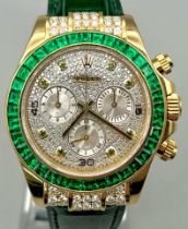 A Very Bling Rolex Cosmograph 18K Gold, Emerald and Diamond Watch. Green leather strap and Rolex