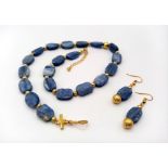 An excellent quality, unusual, large beaded, natural Kyanite necklace and earrings set with gilded