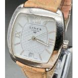 A Links of London Sterling Silver Ladies Watch. Original pink leather strap. Silver case - 31mm.