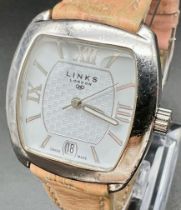 A Links of London Sterling Silver Ladies Watch. Original pink leather strap. Silver case - 31mm.