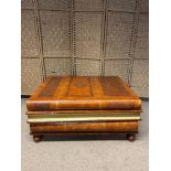 A Vintage Maitland Smith Stacked Book-Style Coffee Table with Three Drawers. Width 28 inches.