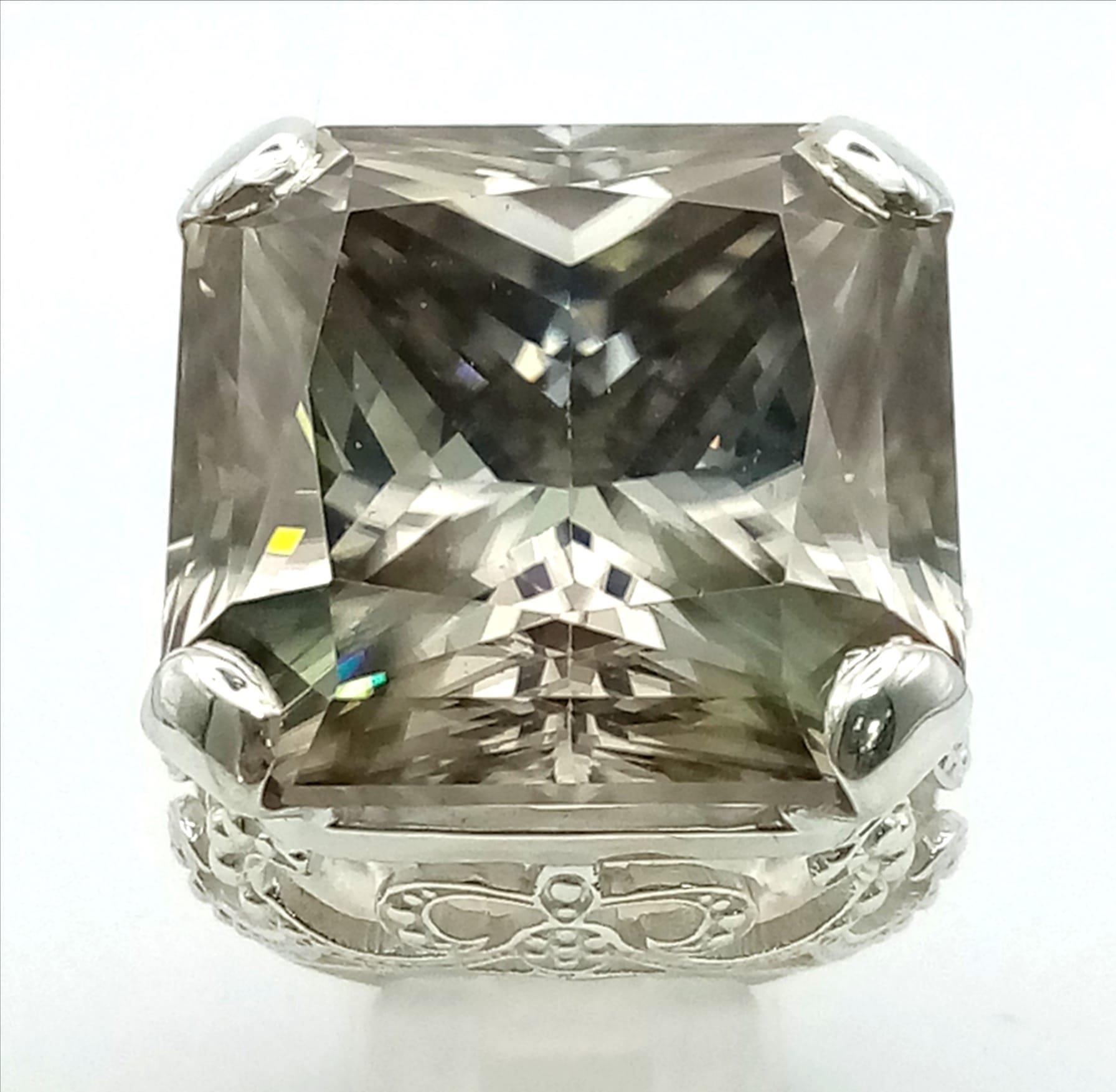 A Rare 79.4ct Brandy Shade Moissanite Ring set in 925 Silver. Size S. 31g total weight. - Image 2 of 6