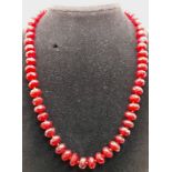 A Garnet Doughnut-Shaped Faceted Bead Necklace. 44cm. Beads - 7/8mm.