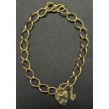 A Light Italian 9K Yellow Gold Heart Clasp Bracelet. Oval links. 18cm. 3.39g