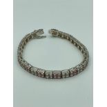 Stunning GEM SET SILVER TENNIS BRACELET With twin rows of pale pink and sparkling clear zirconia