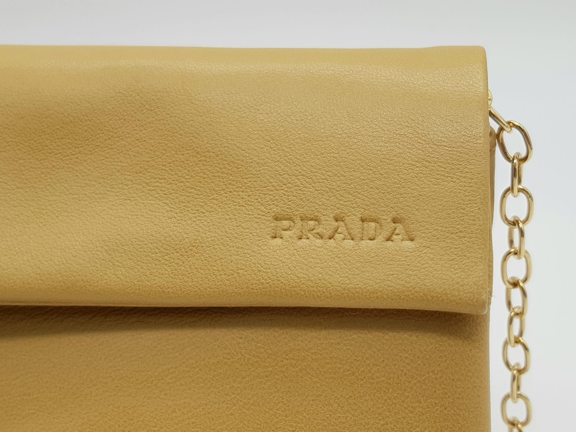 A Prada Brown Leather Clutch Bag in Box. Soft brown leather with gilded hardware. 20cm width by 11cm - Image 4 of 9