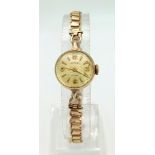 A Vintage 9K Yellow Gold Rotary Ladies Watch. 9K gold bracelet and case - 18mm. Mechanical