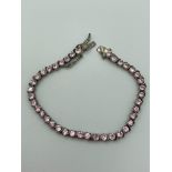 SILVER TENNIS BRACELET set with sparkling pink Zirconia gemstones. 16.5 cm.